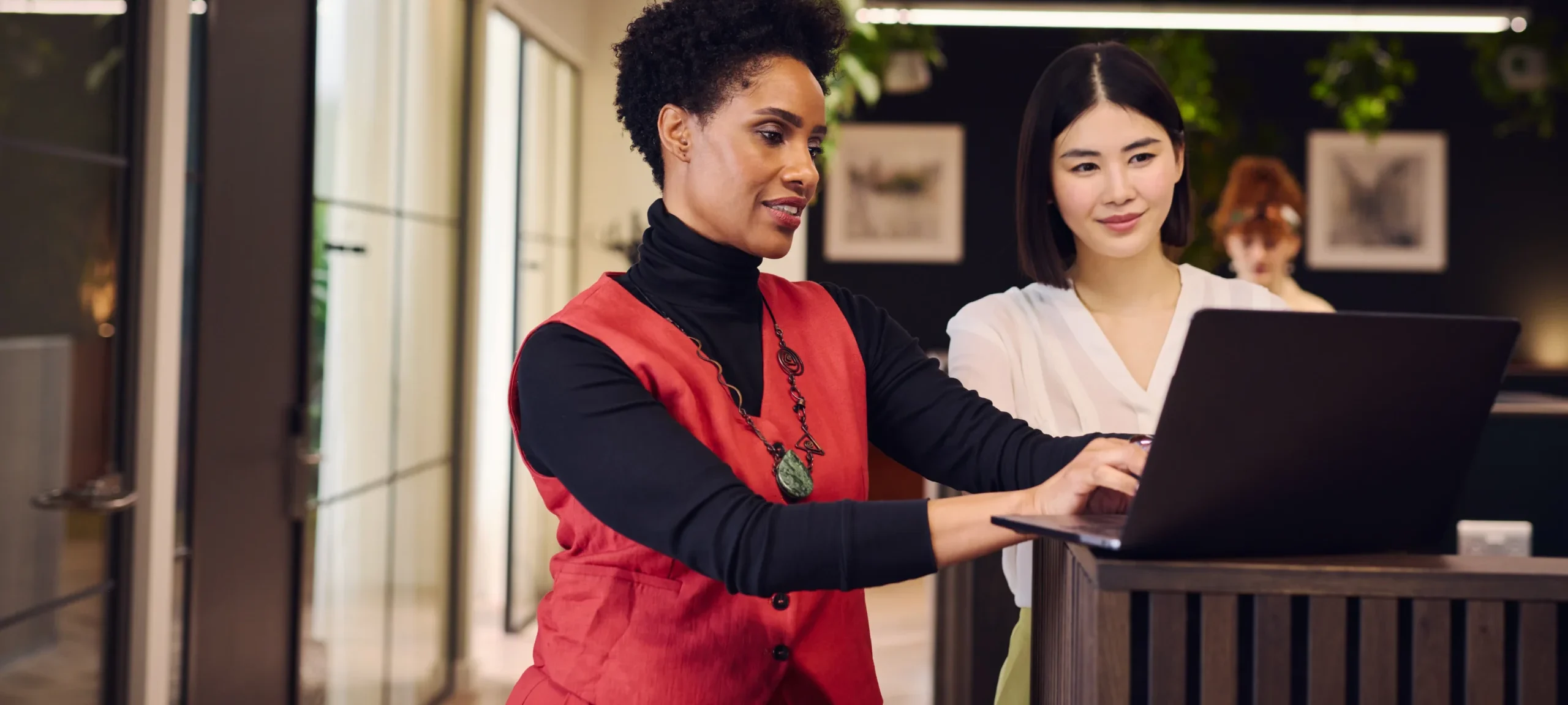 Woman Authenticating Laptop Using The Power of Multi-Factor Authentication