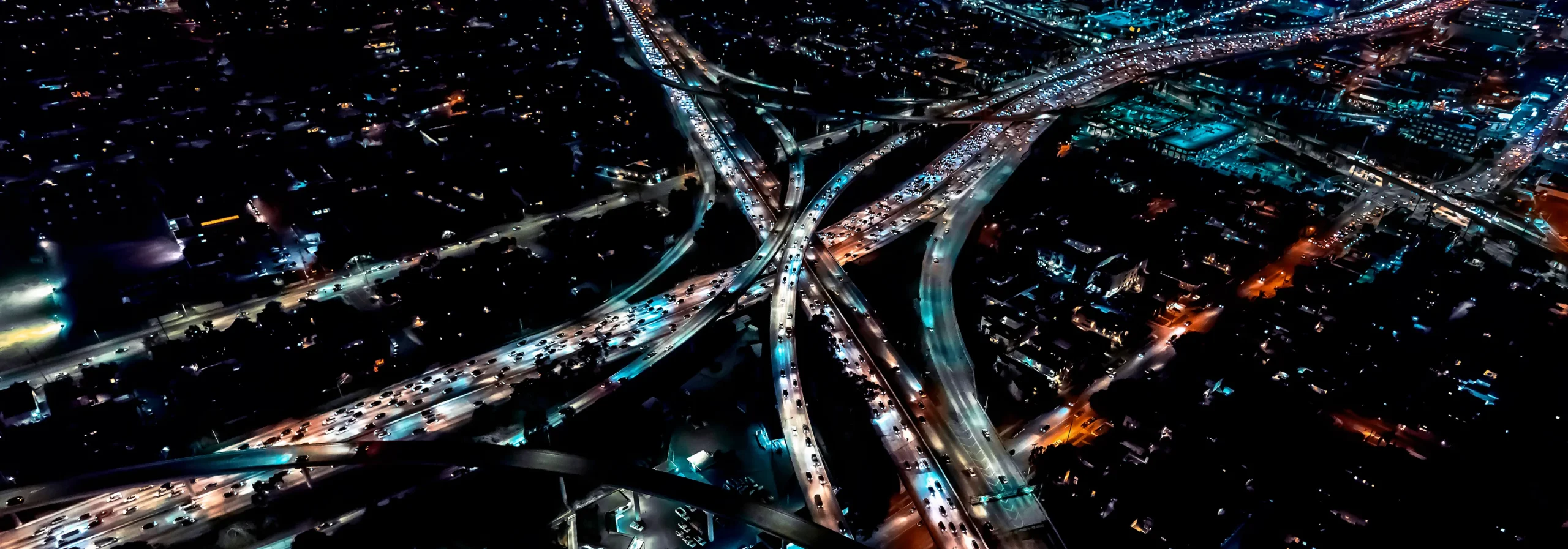 Aerial view of traffic a night, representing large amounts of website traffic